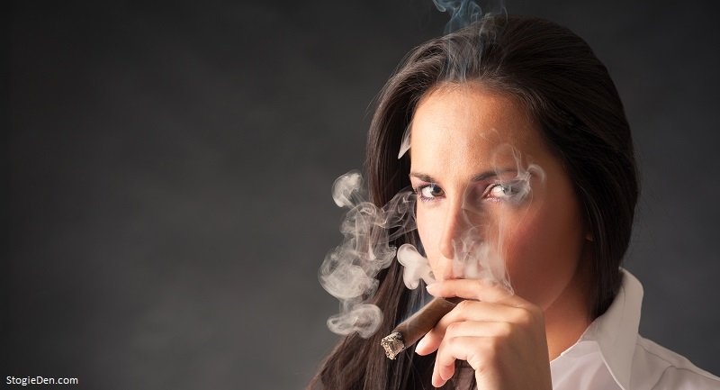 Woman smoking a cigar